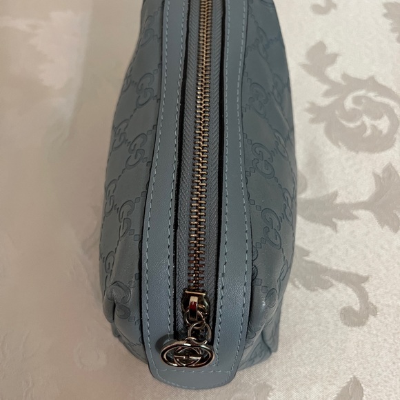Gucci - authentic cosmetic pouch. Pairs beautifully with my Blue Coach handbag. - Picture 4 of 12